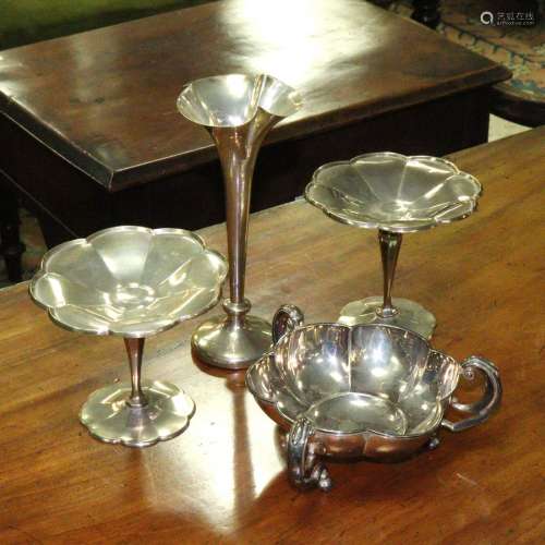 A pair of silver tazze, Roberts & Belk, Sheffield 1908, the lobed tops on tapering columns,