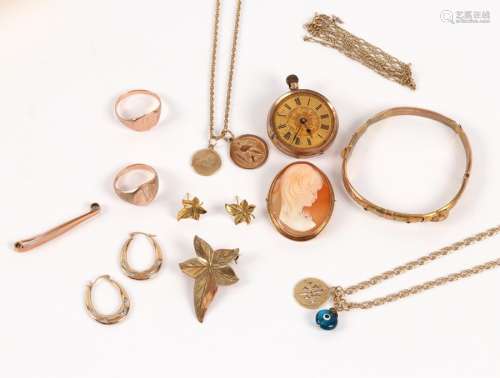A quantity of 9ct gold items to include an open-faced pocket watch, chains, pendants, a leaf brooch,