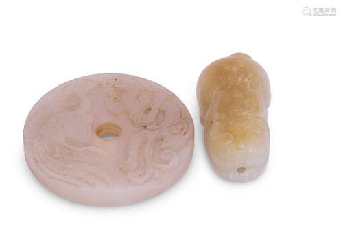 Chinese jade model of a cat, the white jade with russet occlusions, together with a circular disc