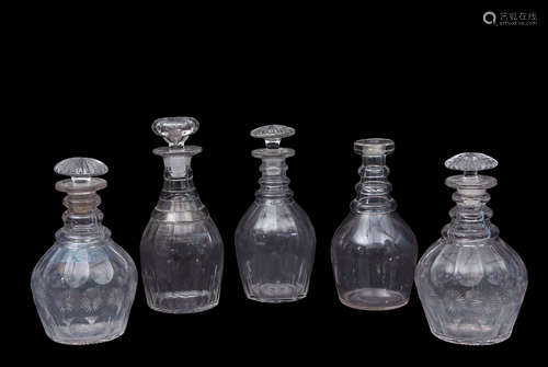 Group of four 19th century cut glass decanters with mushroom stoppers, together with a further