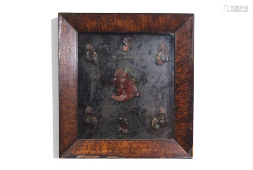 Monogrammed framed and glazed collection of waxwork profiles of 19th century historical figures