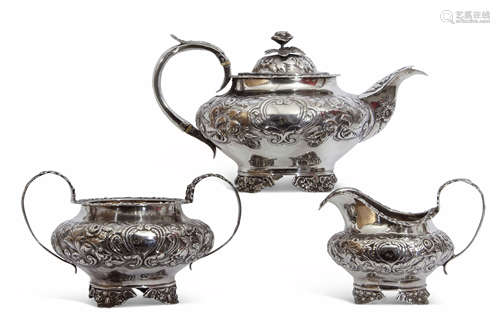 William IV three piece silver tea service comprising tea pot with hinged lid, a flower bud finial