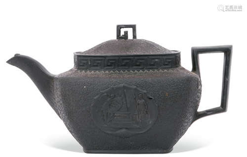 Mid-19th century black basalt tea pot commemorating the death of Lord Nelson with moulded decoration