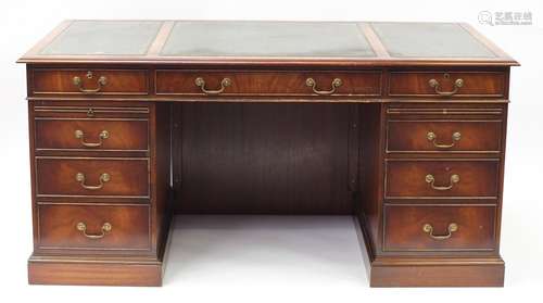 Mahogany twin pedestal desk with brushing slides and nine drawers, 75cm H x 157cm W x 87.5cm D : For