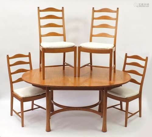 Ercol elm oval extending dining table with four chairs, the table 94.5cm H x 163cm W x 107.5cm D :