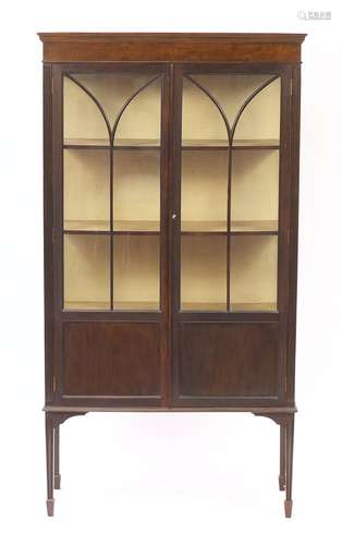 Edwardian mahogany display cabinet, raised on tapering legs, 168cm H x 90.5cm W x 32.5cm D : For