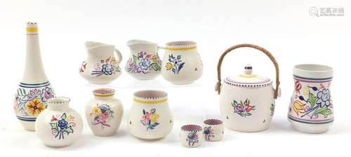 Poole Pottery including vases, each hand painted with flowers, the largest 26cm high : For Condition