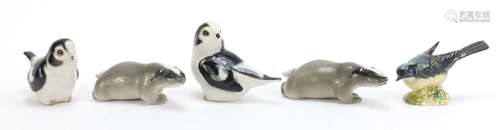 Collectable animals comprising two USSR badgers, two USSR birds and a Beswick bird, the largest 12cm