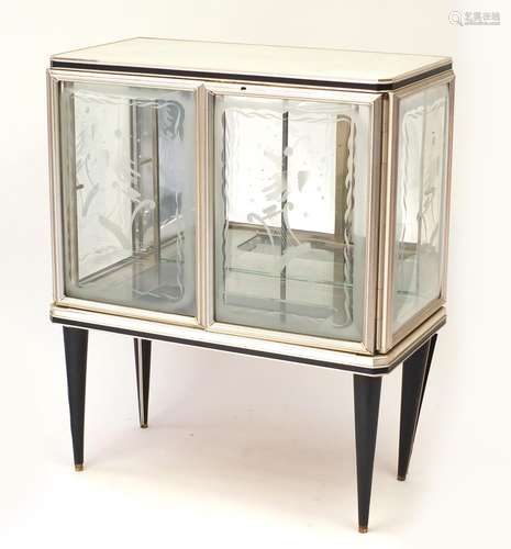 1950's Retro Italian style glass cabinet, the bow fronted doors and sides etched with musical lyre