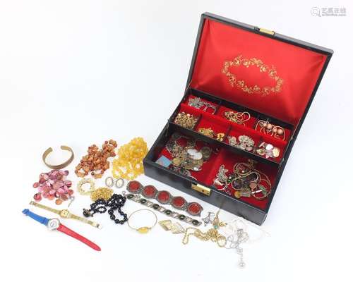 Antique and later costume jewellery housed in a jewellery box, some silver, including a Chinese