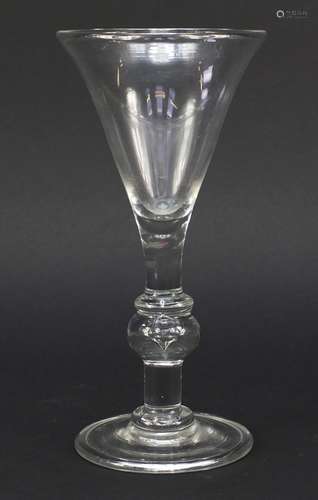 Large 18th century wine glass with tear drop knopped stem and folded foot, 23.5cm high : For