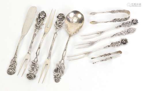 German 800 grade silver cutlery including forks and sugar tongs, housed in a WMS boxes, the