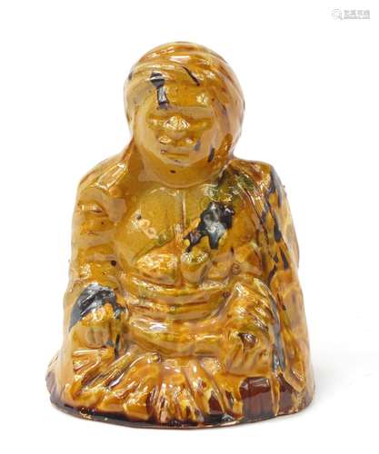 Turkish Canakkale pottery figure of a man having a yellow and brown glaze, 15.5cm high : For