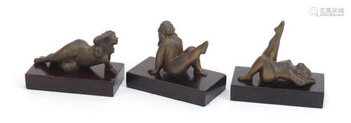 Three South African bronze sculptures of nude females raised on a rectangular wood bases by Jean