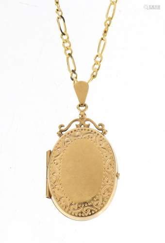 9ct gold oval locket pendant, 3.5cm in length, 3.0g, on a 14ct gold Figaro link necklace, 60cm in