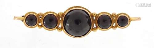 Victorian unmarked gold cabochon garnet bar brooch, 4.7cm in length, 6.0g : For Condition Reports