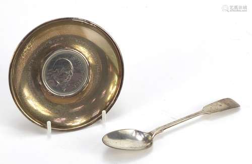 Victorian silver teaspoon and a silver dish inset with a Churchill crown, the largest 14.5cm in