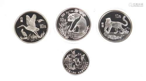 Four Chinese silver coins with certificates of authenticity including three 10 yuans : For Condition