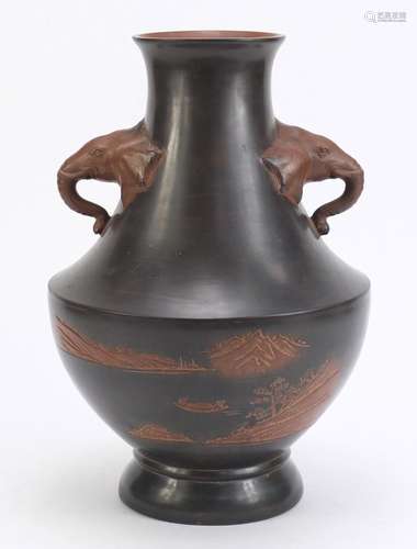 Chinese Yixing teracotta vase with elephant head handles, incised with a landscape, 33cm high :