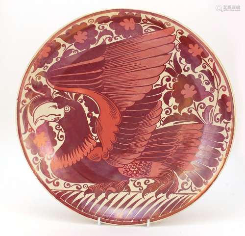 Arts & Crafts ruby lustre charger by William de Morgan, hand painted with a stylised bird, impressed