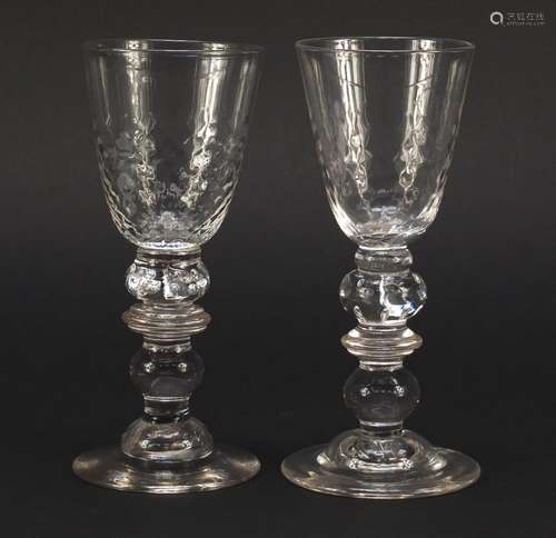 Pair of early 19th century ale glasses with knopped baluster stems, each 16cm high : For Condition