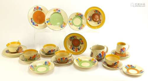 Art Deco Clarice Cliff teaware hand painted in the Crocus pattern including cups, plates and milk