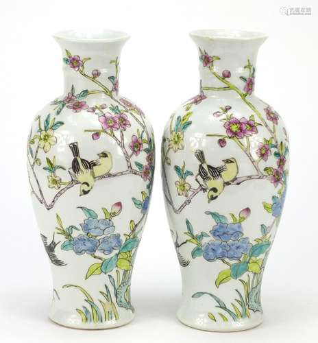 Pair of Chinese porcelain vases hand painted with birds amongst trees, iron red character marks to