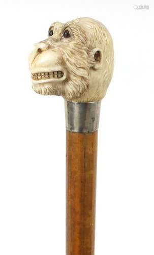 Good Victorian Malacca walking stick with carved ivory pommel in the form of a monkey's head, having