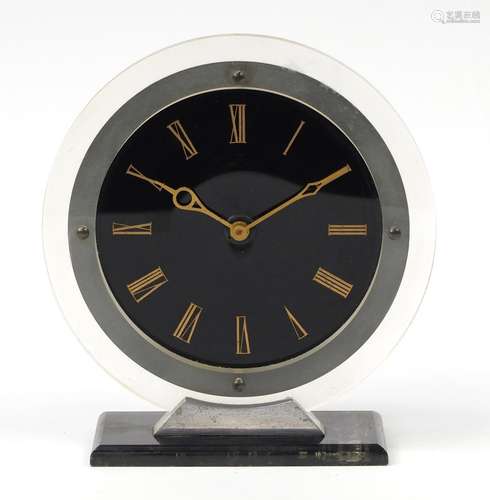 Vintage Temco black and clear plastic electric clock, made in England by the Telephone MFG CO.