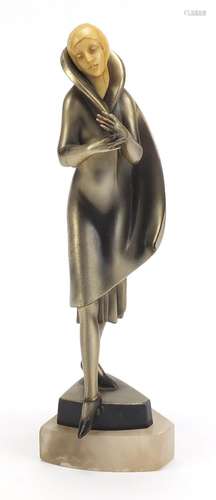 Art Deco bronzed figure of a female with carved ivory head, raised on a shaped onyx base, 25cm