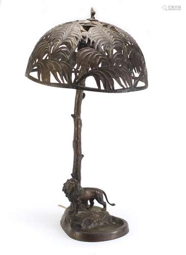 Otto Kainz Austrian bronze table lamp with a lion standing under a pierced tree shade, impressed '