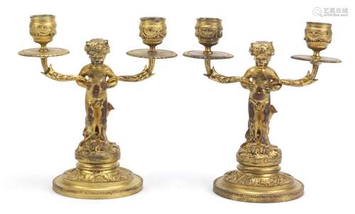 Pair of gilt bronze pan design two branch candlesticks, each 19.5cm high : For Condition Reports