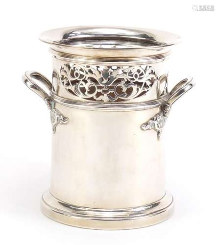 George V silver wine bottle stand with twin handles by Mappin & Webb Sheffield 1929, 16cm high,