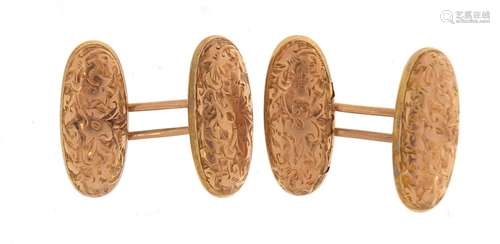 Pair of 9ct gold cufflinks with chased decoration, 2cm in length, 4.0g : For Condition Reports