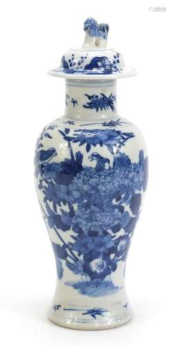 Chinese blue and white porcelain baluster vase and cover, hand painted with birds amongst flowers,