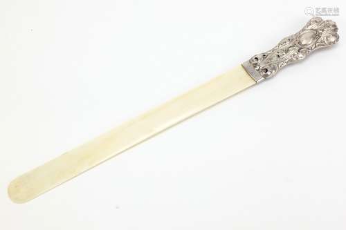 Victorian ivory page turner with silver handle, Birmingham 1898, 41cm in length : For Condition