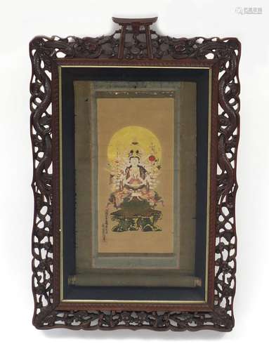 Tibetan hand painted scroll of buddha housed in a Chinese hardwood frame carved with dragons, 70cm x