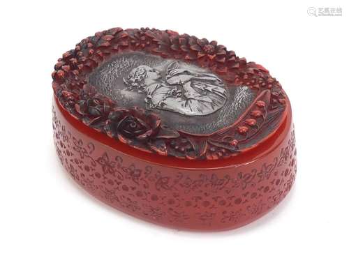 French amber coloured snuff box decorated with a female holding a bird, signed to the base, 7.5cm