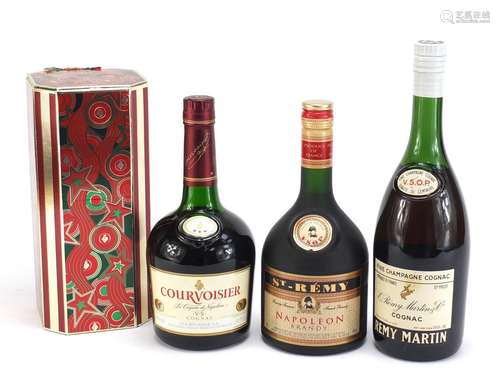 Three bottles of cognac/brandy comprising Vintage Remy Martin VSOP, Courvoisier with box and