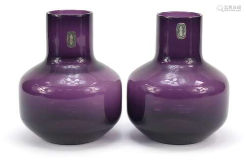 Pair of Whitefriars mallet shaped amethyst glass vases with paper labels, each 17cm high : For