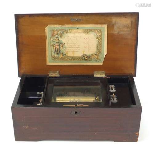 Victorian wooden musical box with rosewood floral inlaid top, playing on eight airs including Little