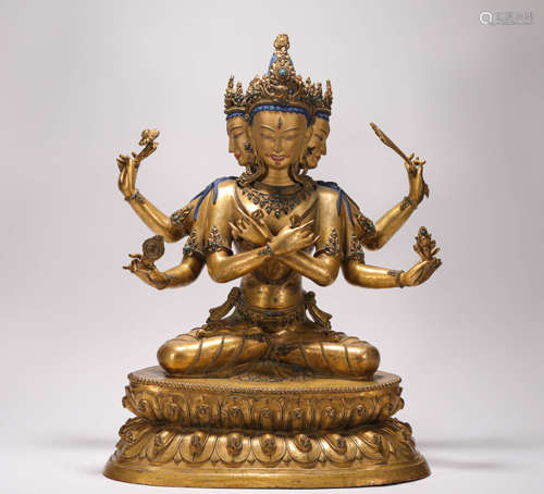 A bronze gilt three-headed six-armed Buddha statue in the Qing Dynasty清代铜鎏金三头六臂佛造像