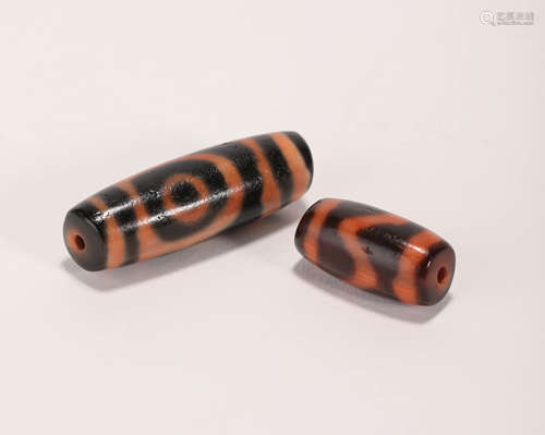 two-pieces tiger teeth bead from Tang唐代俩眼虎牙天珠