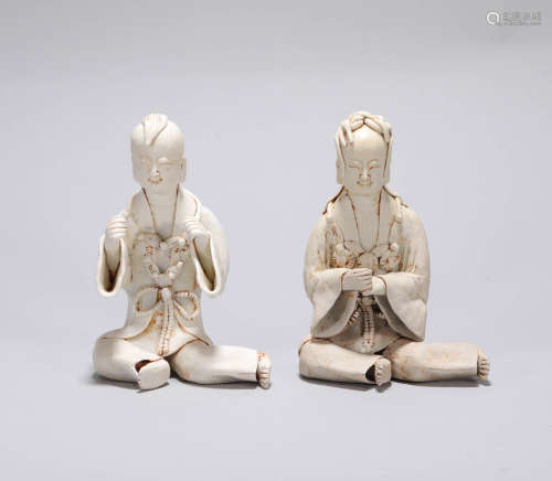 A pair of white porcelain boys and girls in the Qing Dynasty清代白瓷童男童女一对