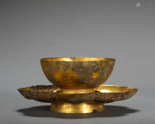 ANCIENT CHINESE GILT BRONZE CUP AND SAUCER