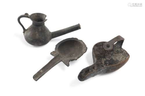 THREE PERSIAN BRONZE OIL LAMPS 19TH CENTURY.