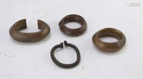 FOUR CENTRAL AFRICAN BRONZE BRACELETS EARLY 20TH CENTURY.