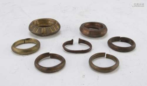 SEVEN CENTRAL AFRICAN COPPER AND BRONZE BRACELETS EARLY 20TH CENTURY