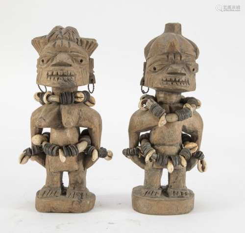 A YOMBÈ WOODEN SCULPTURES DEPICTING A COUPLE OF ANCESTORS CONGO 20TH CENTURY.