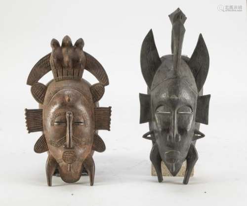 TWO AFRICAN WOOD ANTHROPOMORPHIC MASKS. KOTA GABON 20TH CENTURY.